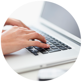 Hands typing on computer keyboard 